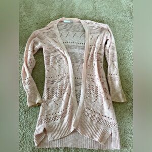 Girl’s long pink cardigan